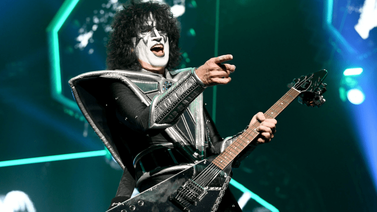 Tommy Thayer played on a Kiss album 13 years before he joined the band